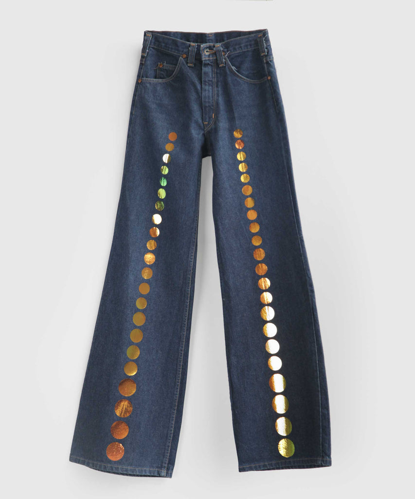 line of dots printed jeans reflective gold