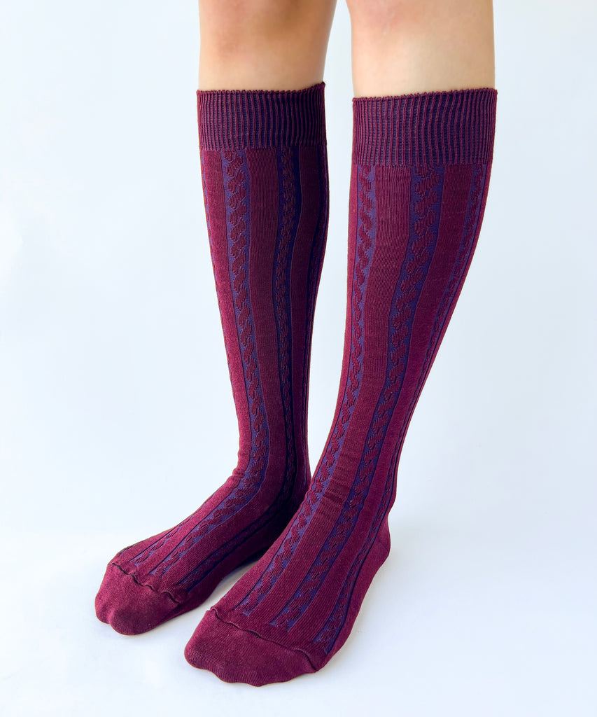 Purple knee-high cotton socks with a textured pattern