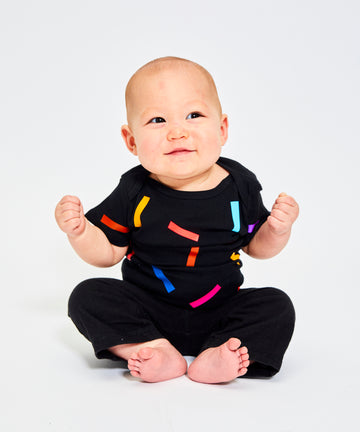 organic cotton baby onesie confetti print black