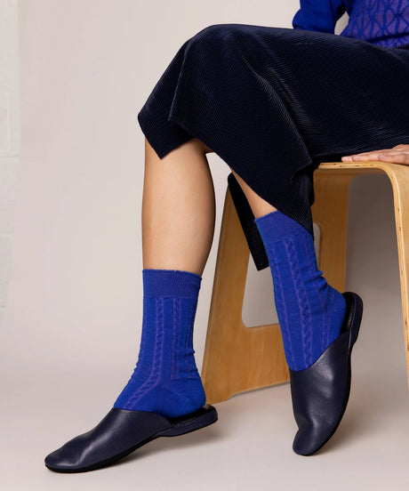 A pair of unisex, lightweight cable dressy cotton socks in cobalt blue made in Canada by Toronto brand OkayOk