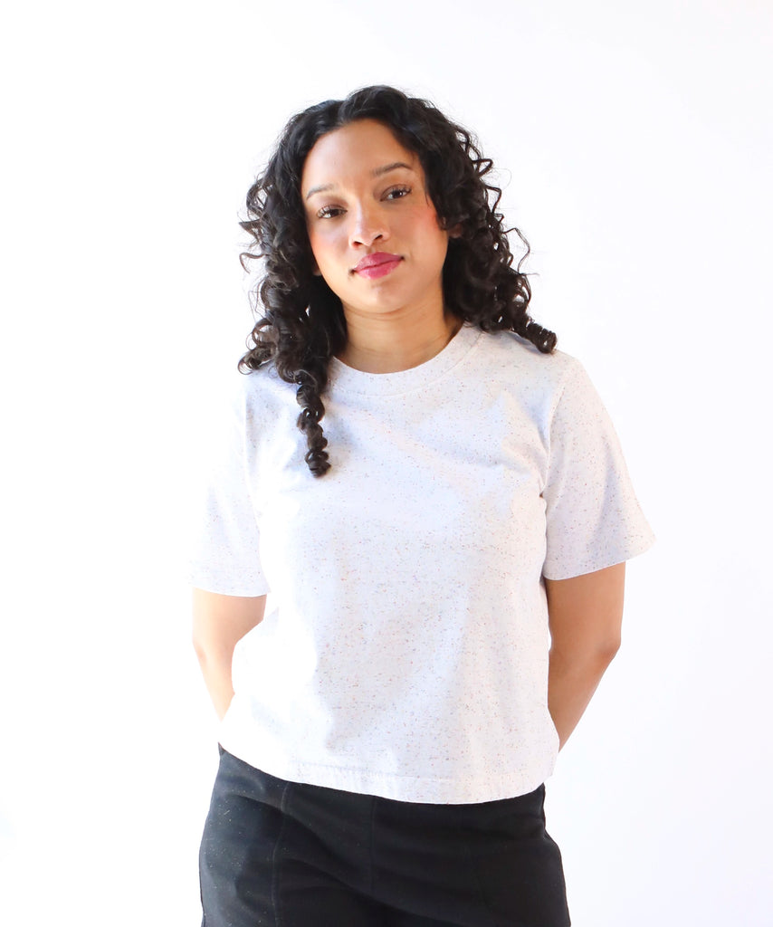 woman wearing a white cotton tshirt in boxy cropped cut