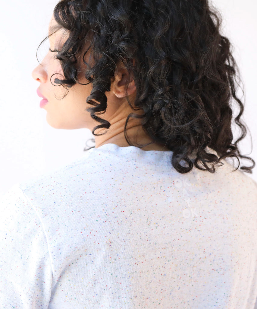 woman wearing a white cotton tshirt in boxy cropped cut