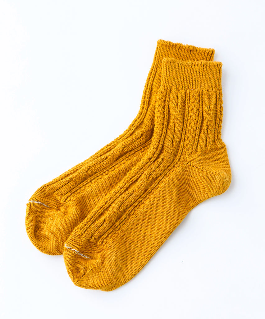 100% cotton ankle socks with knit pattern in mustard yellow