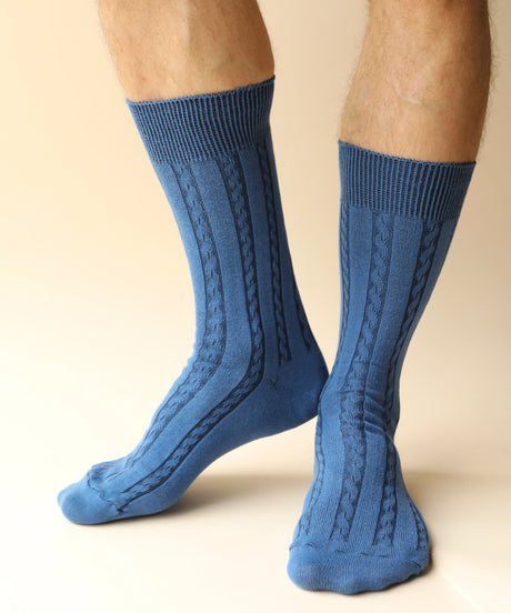 A pair of unisex, lightweight cable dressy cotton knee high socks in blue made in Canada by Toronto brand OkayOk 