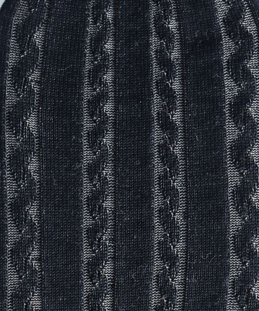 Close-up of a textured black and gray cable sock