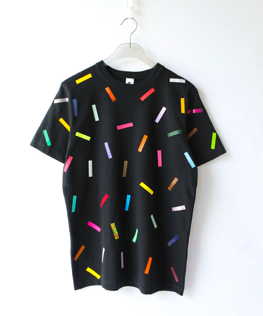 a black cotton t-shirt with colorful confetti sprinkles on it