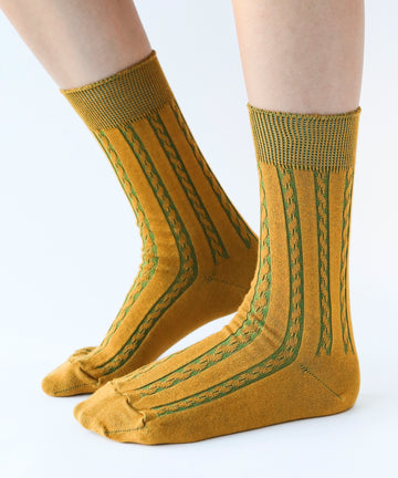 Cotton dress socks with cable design in mustard yellow and green