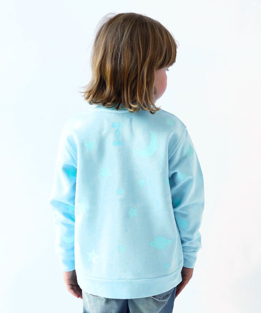 a glow in the dark star printed cotton sweatshirt in light blue