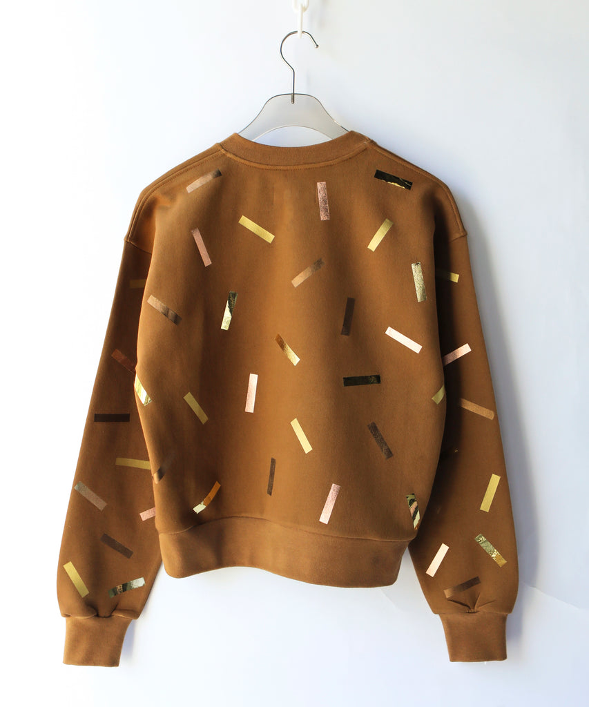 Brown sweatshirt with gold and bronze confetti sprinkle print design