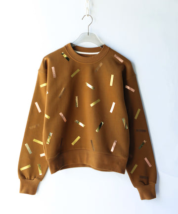Brown sweatshirt with gold and bronze confetti sprinkle print design