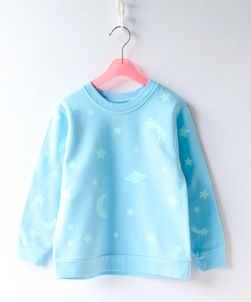 a glow in the dark star printed cotton sweatshirt in light blue