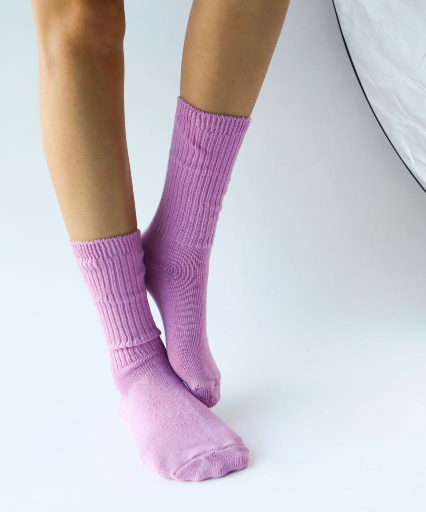a pair of cotton socks in orchid pink