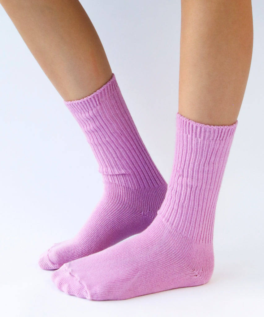 a pair of cotton socks in orchid pink