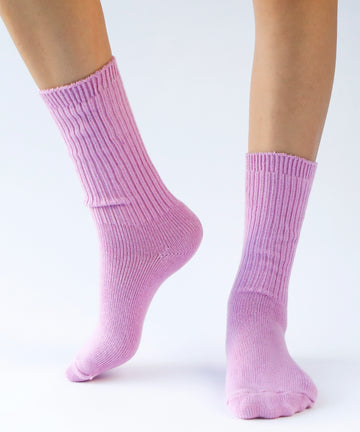 a pair of cotton socks in orchid pink