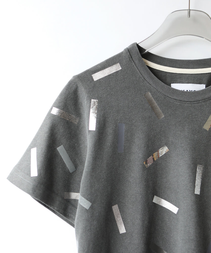 a boxy cotton tshirt in dark grey with silver confetti sprinkle graphic print