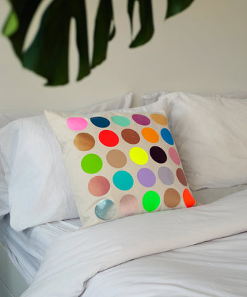 natural canvas colourful polka dot graphic pillow