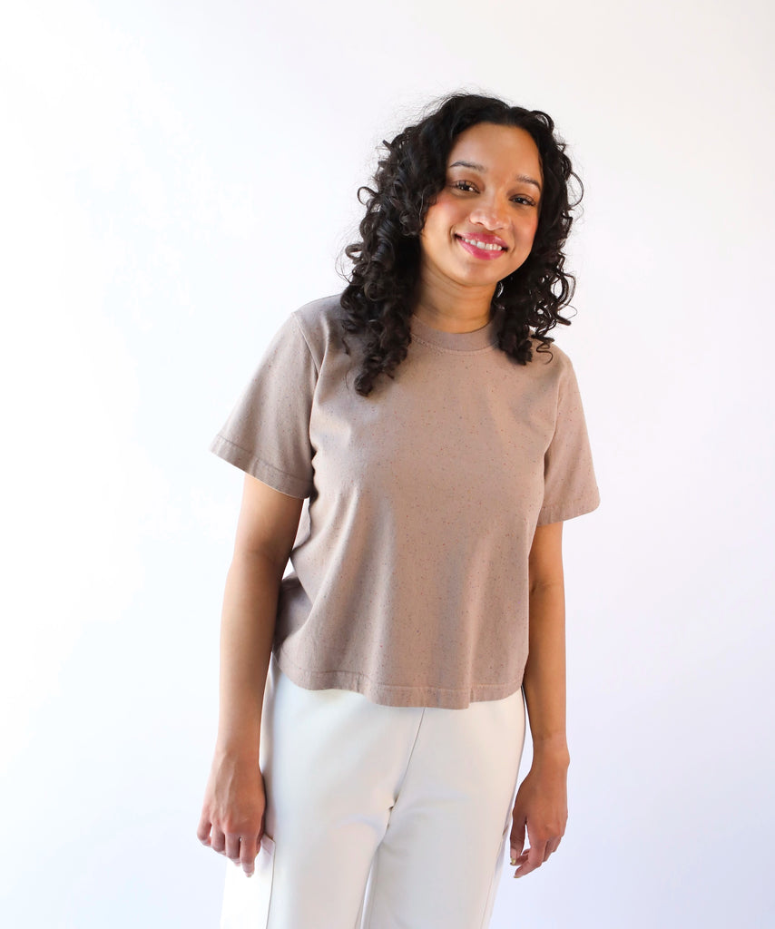 Woman wearing a beige taupe cotton t-shirt 