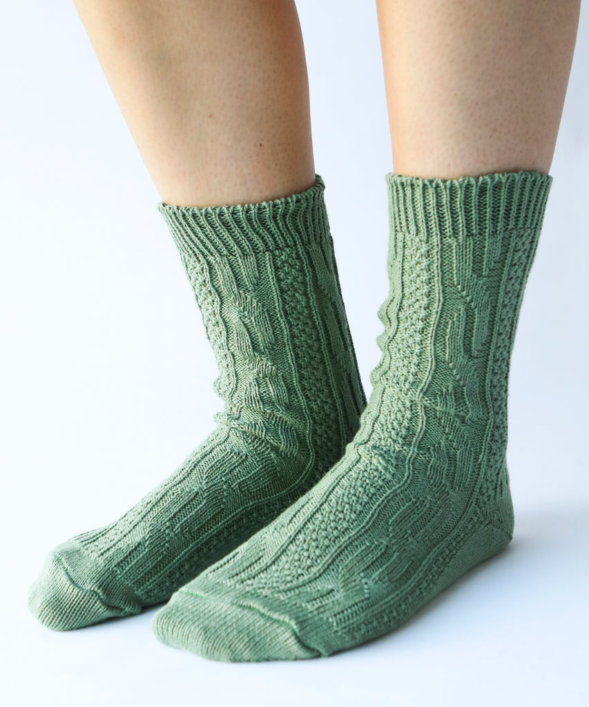 100% cotton socks with knit pattern in sage green
