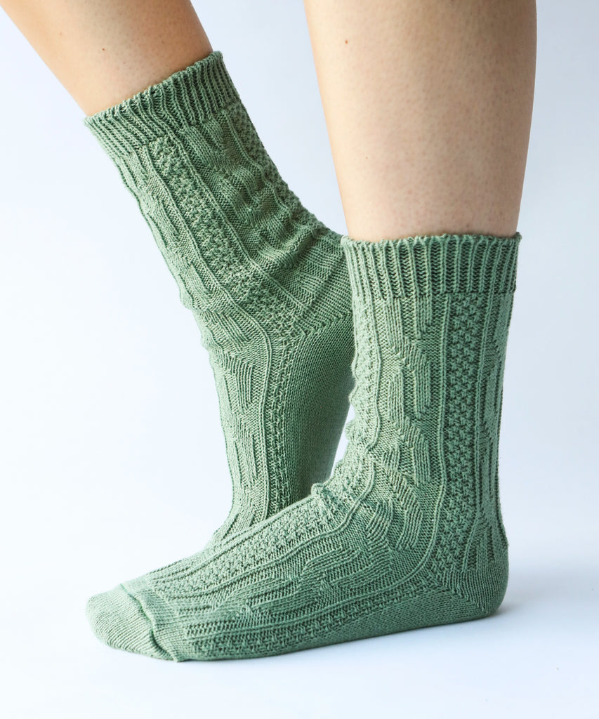 100% cotton socks with knit pattern in sage green