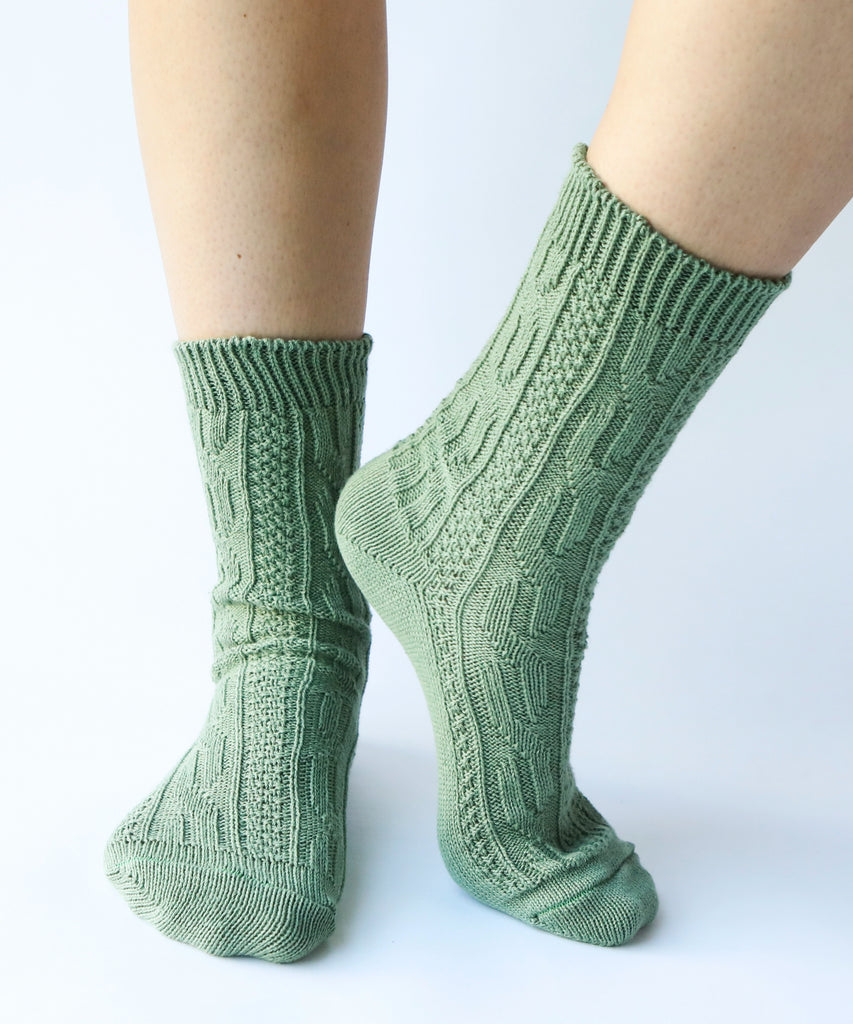 100% cotton socks with knit pattern in sage green