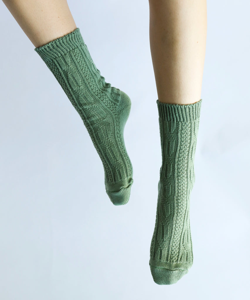100% cotton socks with knit pattern in sage green