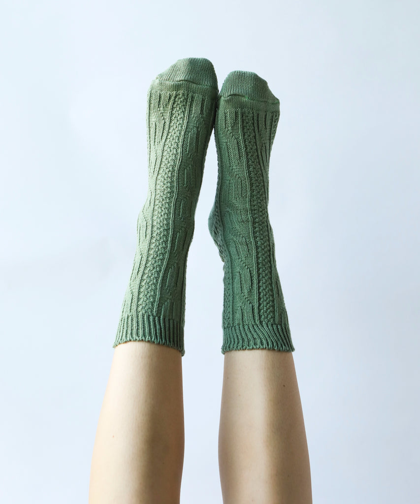 100% cotton socks with knit pattern in sage green