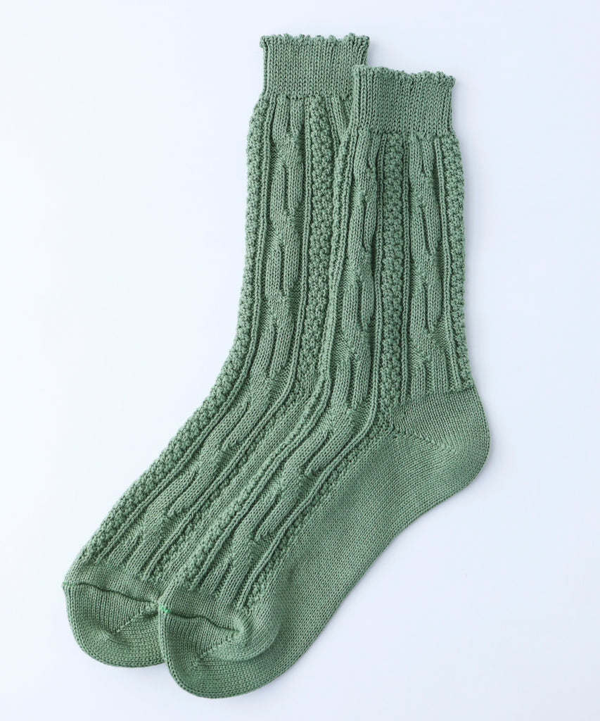 100% cotton socks with knit pattern in sage green