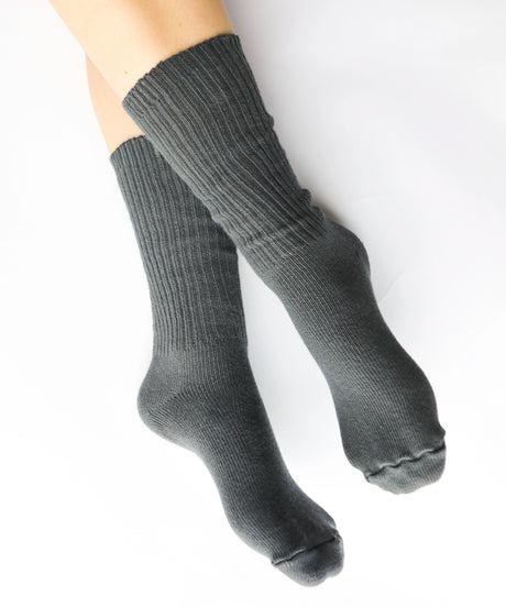 A pair of unisex ribbed crew cotton socks in charcoal grey made in Canada by Toronto brand OkayOk