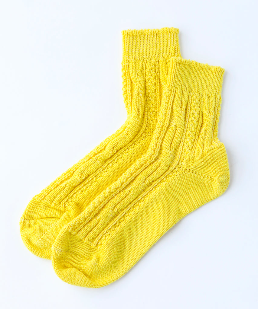 100% cotton ankle socks with knit pattern in bright yellow