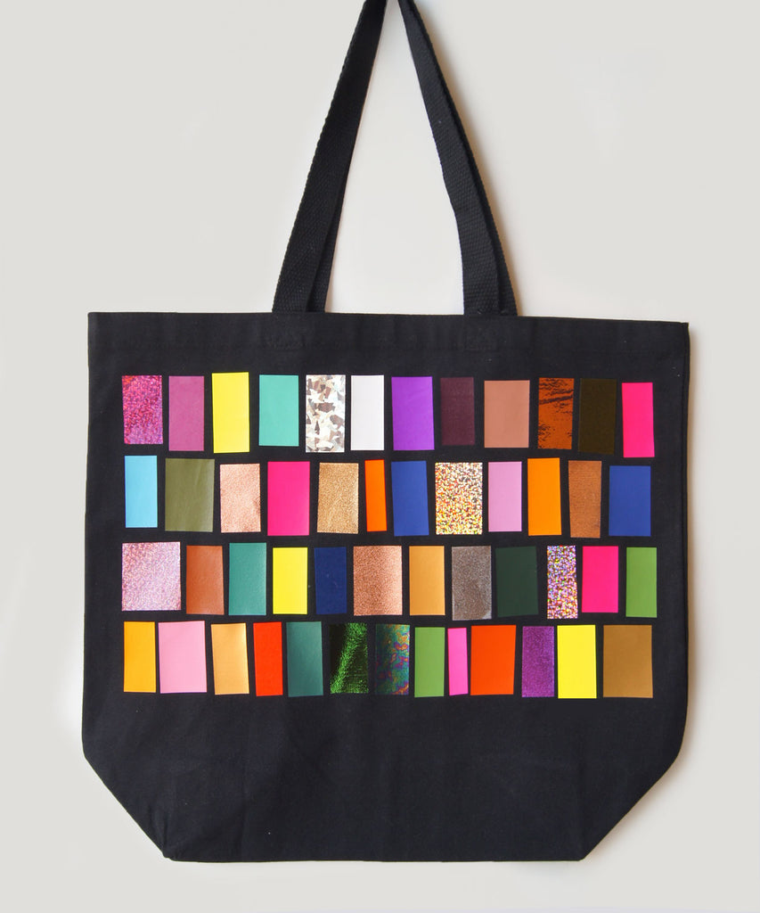 black heavy cotton tote bag with colourful widget print